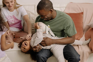 A parent with a happy child.